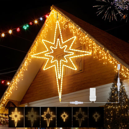 Decorative star-shaped light fixture on a house exterior with fireworks in the background.